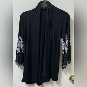 Black Cardigan with White Floral Bell Sleeves
New without tags.